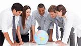 A meeting of business team around a terrestrial globe