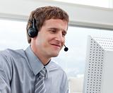 Close-up of businessman working in a call center