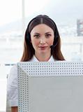 Brunette business woman with headset on