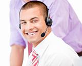 Portrait of a smiling businessman with headset on 