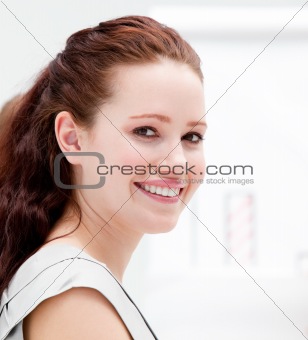Portrait of a smiling businesswoman  during a meeting 