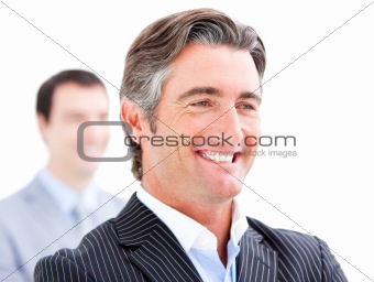 Confident businessman looking at his colleague