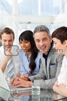 Multi-ethnic business partners sitting together 