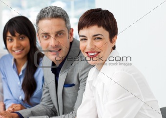 International business people sitting in a row 