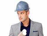 Serious male architect wearing a hardhat 