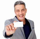 Smiling confident businessman holding a white card 