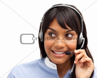 Attractive ethnic customer service representative using headset 