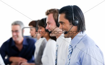 Positive  business people working in a call center