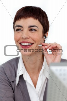 Self-assured businesswoman with headset on