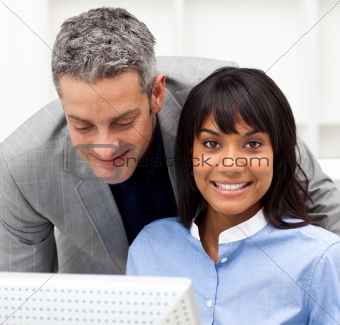 Confident businessman helping his colleague