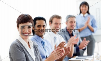 Multi-ethnic business people clapping a good presentation 