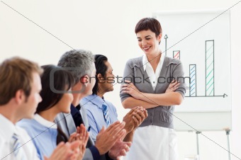 A diverse business group applauding a good presentation 
