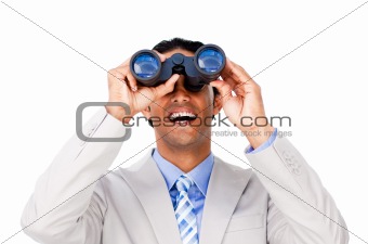 Happy businessman looking through binoculars 