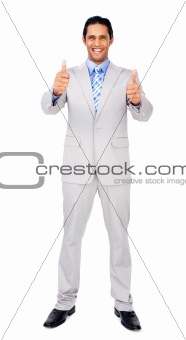 Successful businessman standing with thumbs up