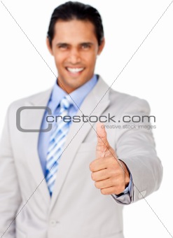 Portrait of an attractive businessman with thumb up