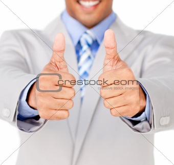 Close-up of a businessman with thumbs up in celebration