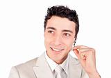 Positive ethnic businessman with headset on 