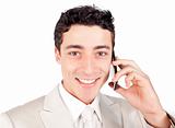 Attractive ethnic businessman talking on phone 