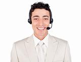 Confident young businessman with headset on 