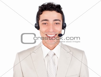 Confident young businessman with headset on 