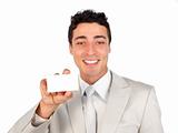 Ethnic charming businessman holding a white card 