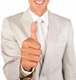 Close-up of a businessman with thumb up 
