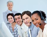 Multi-ethnic business team working in a call center
