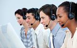 Concentrated business people using headset 