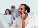 Positive business partners with headset on working in a call center