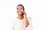 Charming ethnic businesswoman on phone