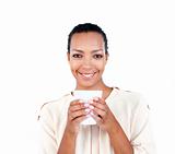Charming businesswoman holding a drinking cup 