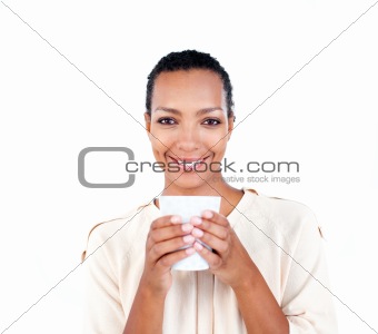 Charming businesswoman holding a drinking cup 