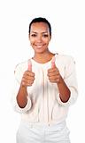 Positive businesswoman with thumbs up 
