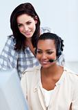 Confident businesswoman with headset on 