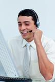 Young businessman using headset 