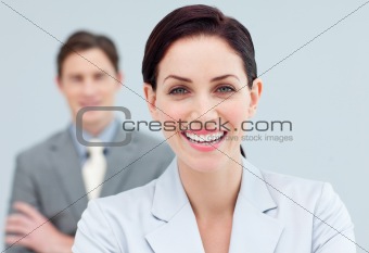 Cheerful business people standing in a row 