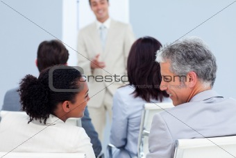 Two business people interacting at a conference