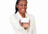 Smiling afro-american businesswoman holding a white card 