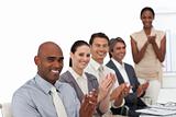 Multi-ethnic business people applauding after a presentation
