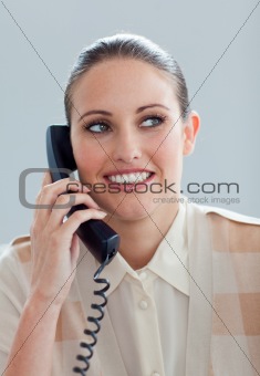 Attractive businesswoman talking on phone