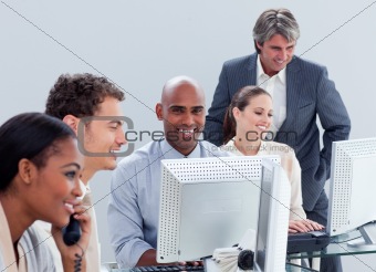 International business team interacting to each other