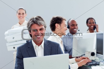 Portrait of a smiling business team at work 