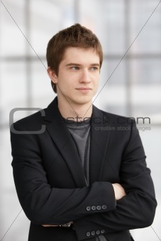 young handsome caucasian man over cool background