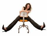 Pretty woman in black seated on orange office chair