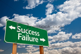 Success, Failure Green Road Sign with Copy Room Over The Dramatic Clouds and Sky.