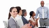 Positive business people clapping a good presentation 