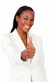 Smiling afro-american businesswoman with thumb up