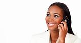 Glowing Afro-american businesswoman on phone 