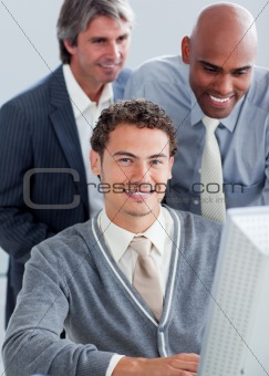 Handsome businessmen working at a computer