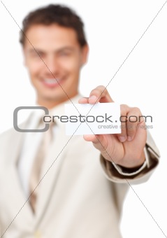 Businessman holding a white card 